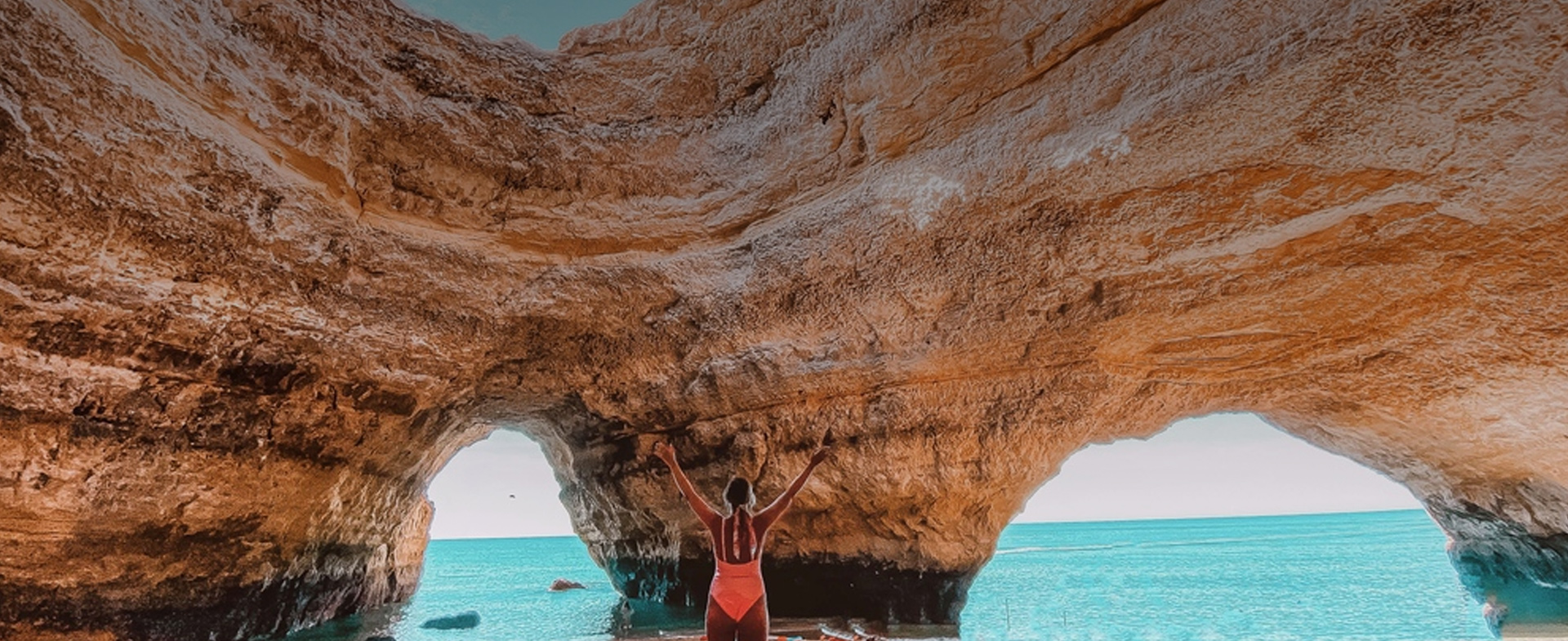 Kayakers exploring Benagil Cave, Algarve, Portugal